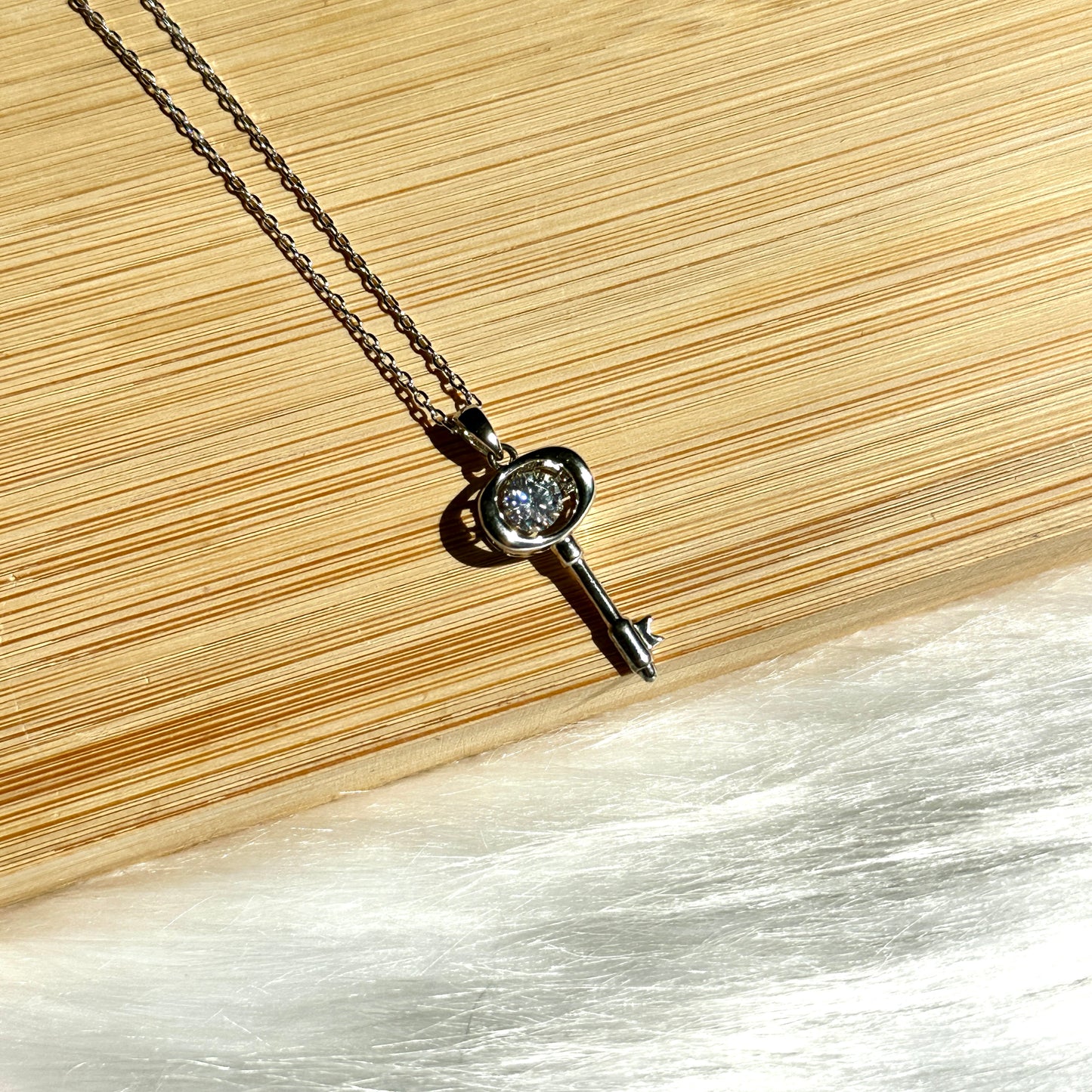 Dancing Diamond 'Key to My Heart' Sterling Silver Moissanite Pendant