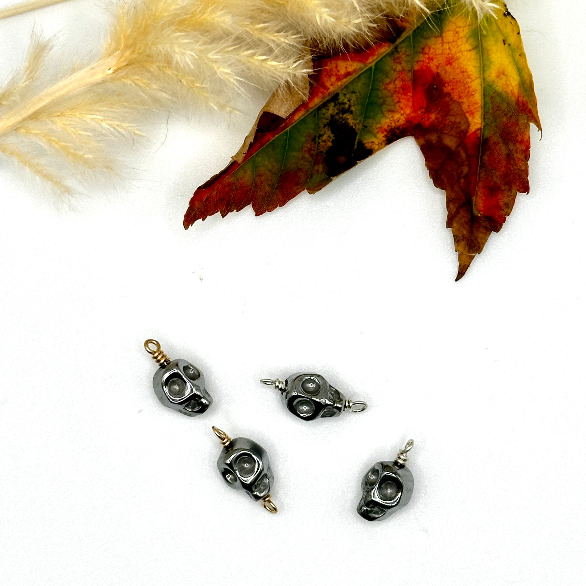 Titanium Hematite Carved Skull Charms & Connectors